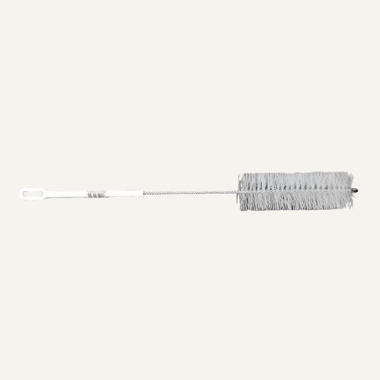Bottle brush cleaning tool on a white background